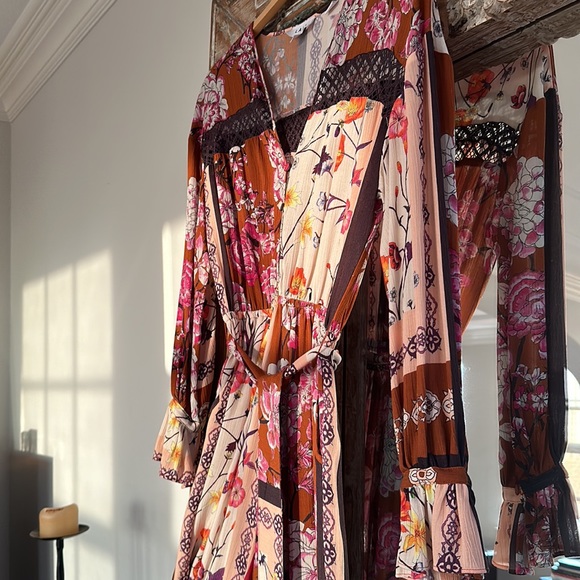 Jumpsuit in rust, brown, cream and splashes of yellow, orange & red flowers. - Picture 3 of 7